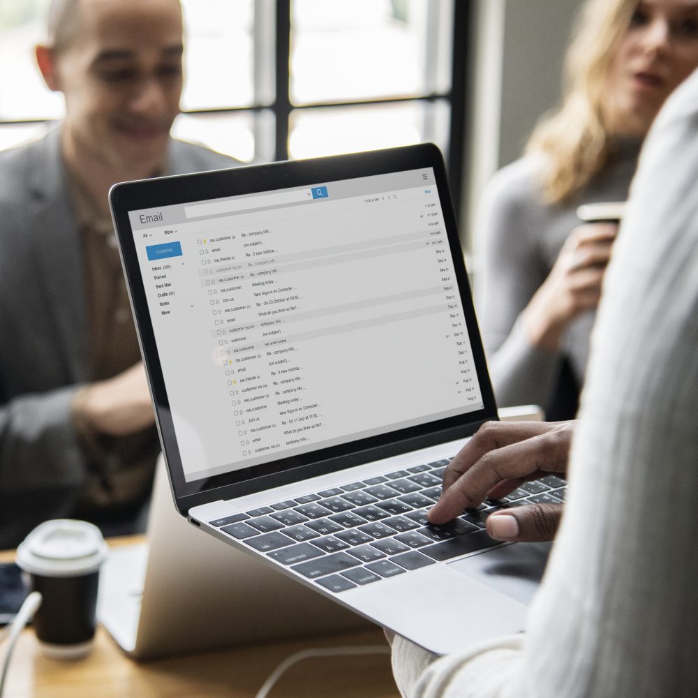 Man checking his email on a laptop